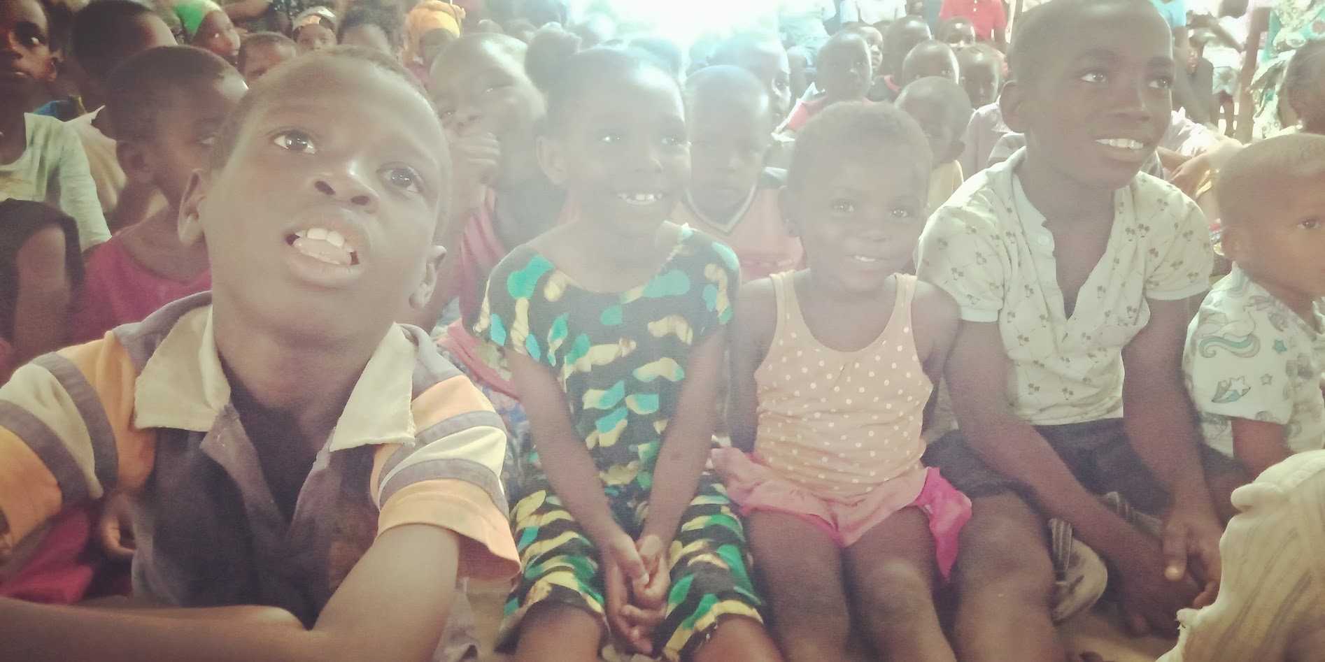 Children smiling at St. Joseph House of Hope Foundation